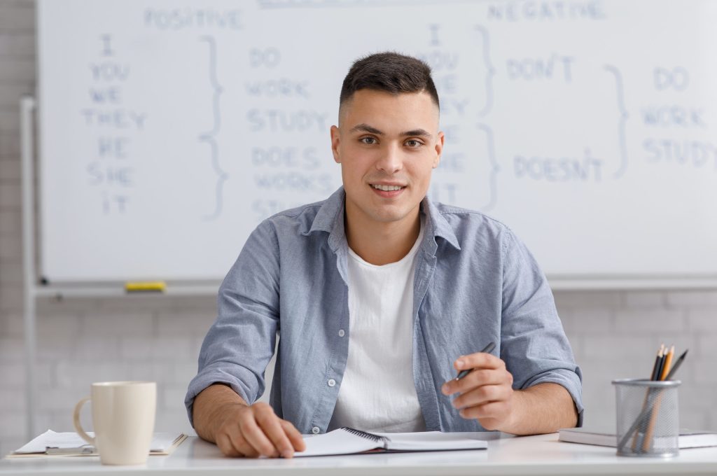 workplace-work-from-home-and-teach-english-with-tutor-attractive-guy-in-casual-talks-with.jpg